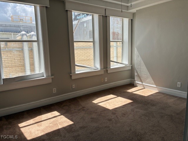 2310 First Street, Unit 703 Fort Myers, FL 33901 - Photo 10 of 28 a view of an empty room and window