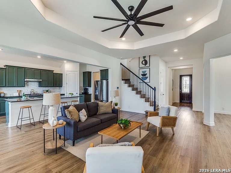 390 Rhapsody View Spring Branch, TX 78070 - Photo 10 of 28 a living room with furniture and wooden floor