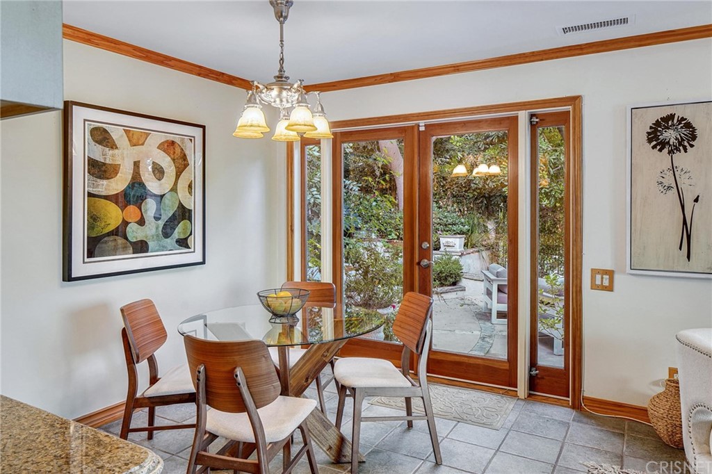 15098 Rayneta Drive Sherman Oaks, CA 91403 - Photo 12 of 43 a dining room with furniture and window