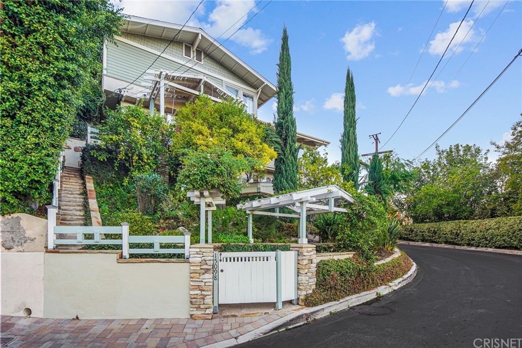 15098 Rayneta Drive Sherman Oaks, CA 91403 - Photo 3 of 43 a view of a house with a yard and sitting area