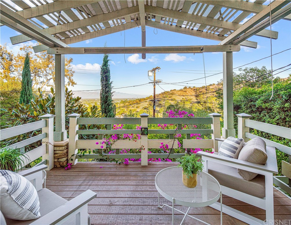 15098 Rayneta Drive Sherman Oaks, CA 91403 - Photo 21 of 43 a room with furniture or window and a potted plant