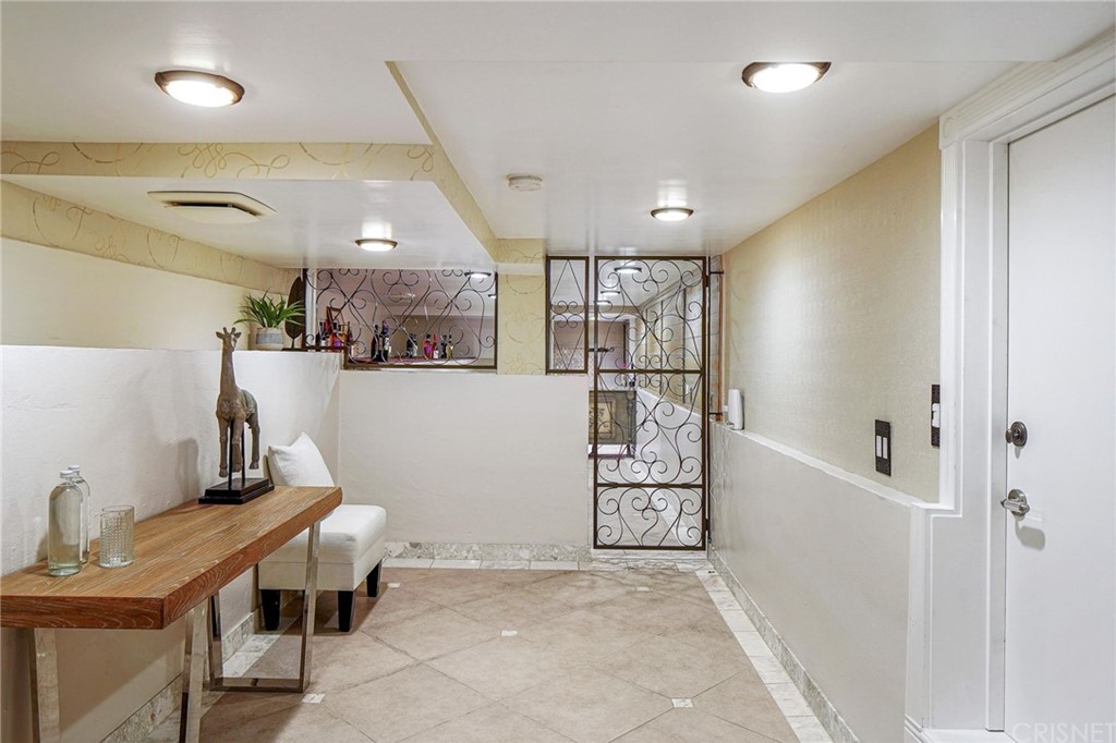 15098 Rayneta Drive Sherman Oaks, CA 91403 - Photo 29 of 43 a view of a hallway with workspace and a window