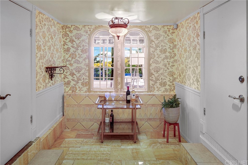 15098 Rayneta Drive Sherman Oaks, CA 91403 - Photo 34 of 43 a dining room with furniture and window
