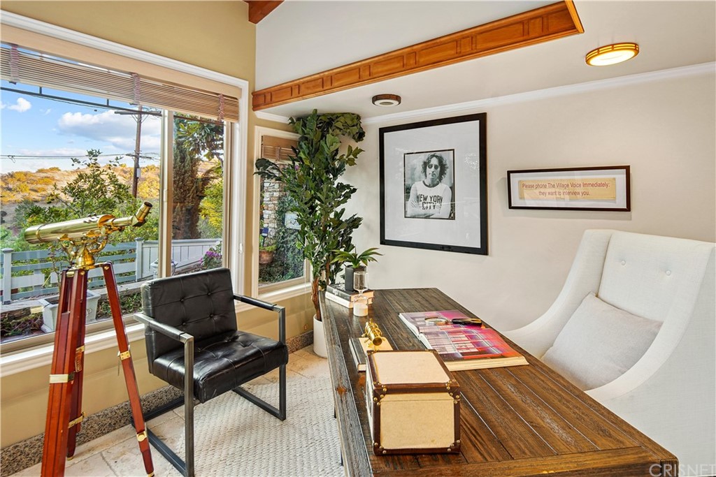15098 Rayneta Drive Sherman Oaks, CA 91403 - Photo 36 of 43 a living room with furniture and a potted plant