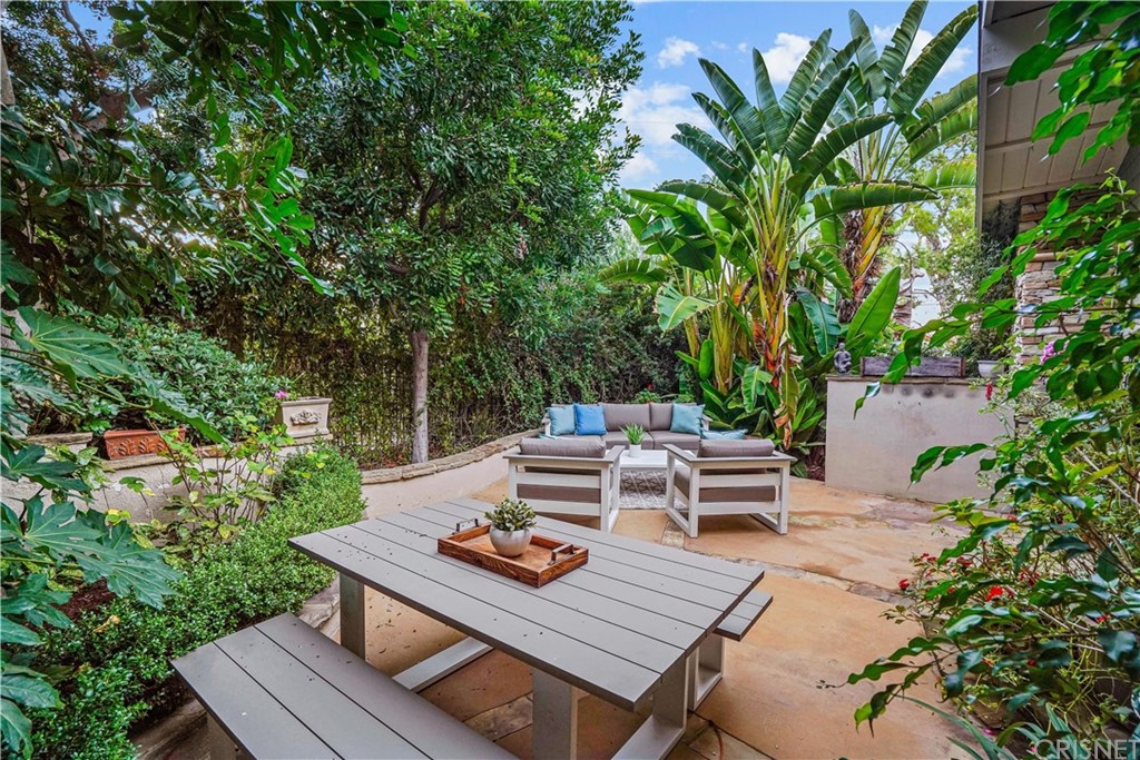 15098 Rayneta Drive Sherman Oaks, CA 91403 - Photo 38 of 43 a view of a backyard with sitting area