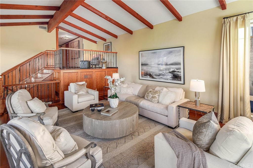 15098 Rayneta Drive Sherman Oaks, CA 91403 - Photo 5 of 43 a living room with furniture and a window