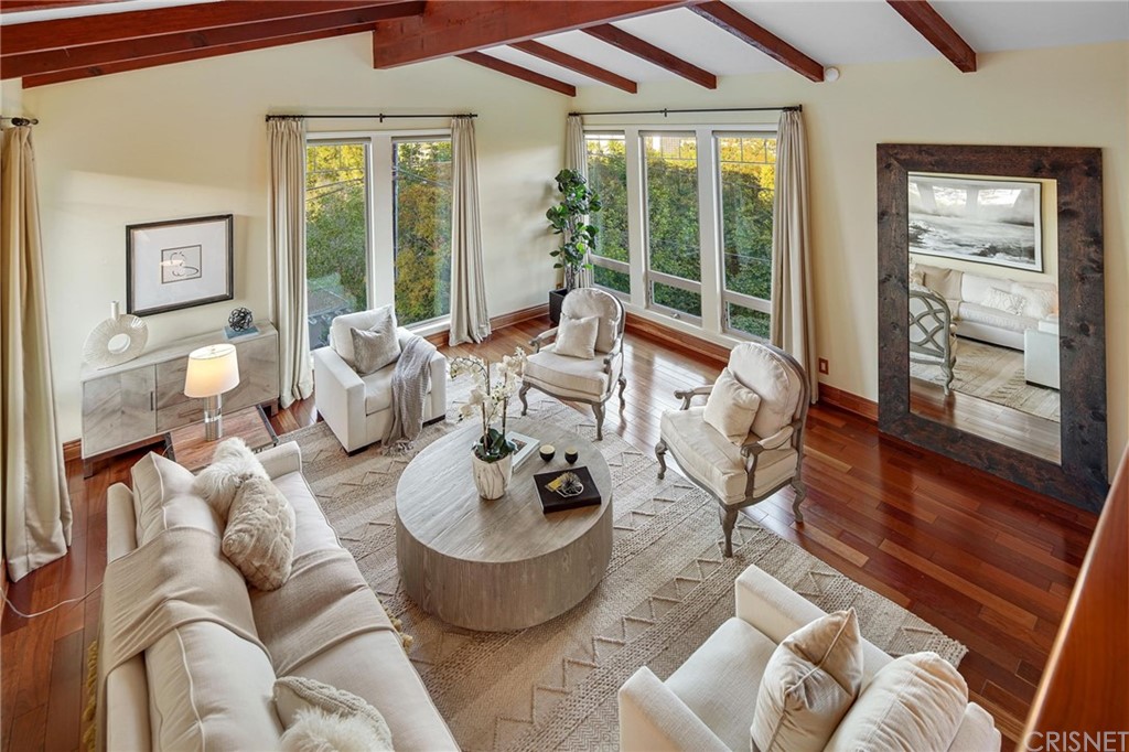 15098 Rayneta Drive Sherman Oaks, CA 91403 - Photo 7 of 43 a living room with furniture and large windows