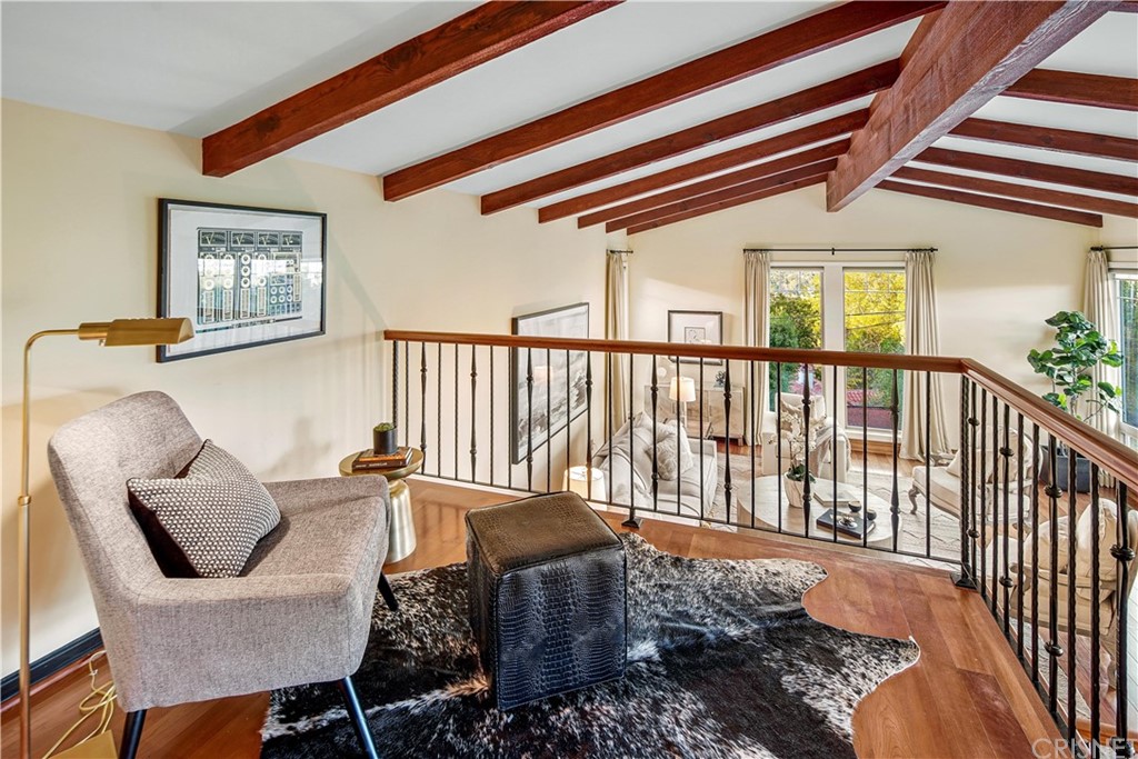 15098 Rayneta Drive Sherman Oaks, CA 91403 - Photo 8 of 43 a balcony with table and chairs