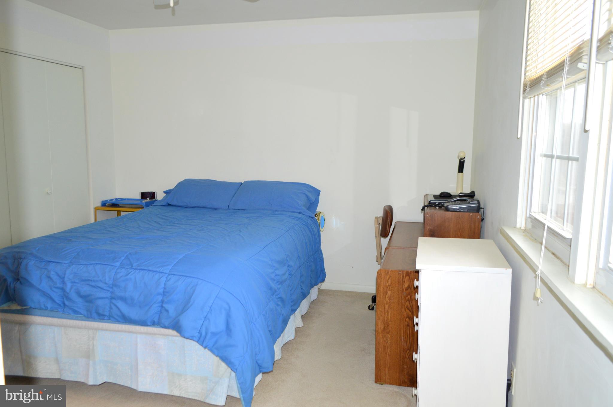 526 Holly Hunt Road Baltimore, MD 21220 - Photo 7 of 18 a bedroom with a bed and a window