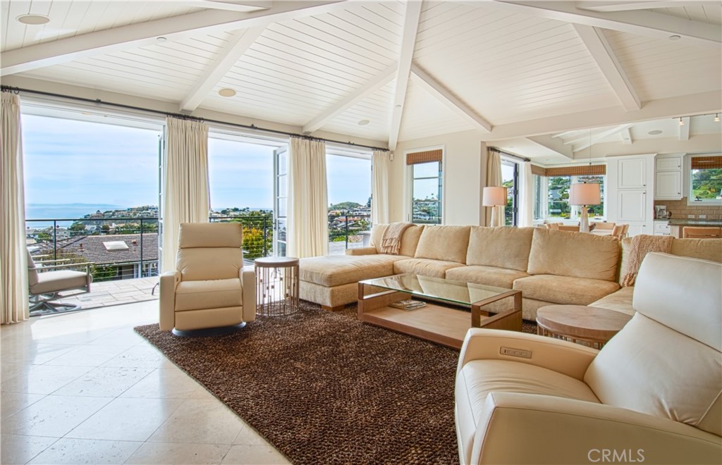 322 Emerald Bay Laguna Beach, CA 92651 - Photo 5 of 34 a living room with furniture and a large window