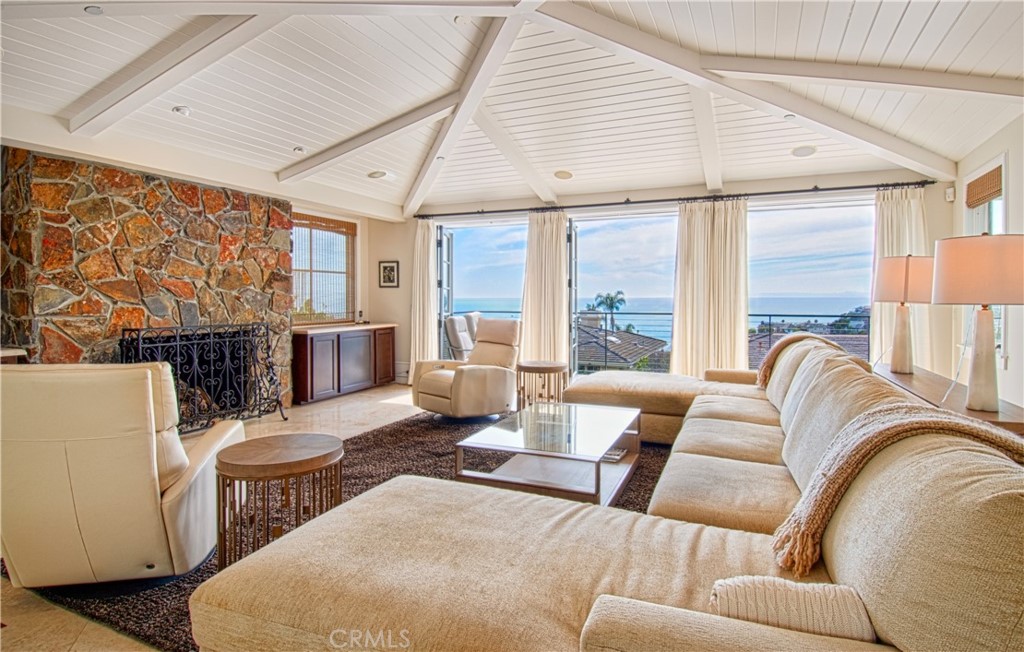 322 Emerald Bay Laguna Beach, CA 92651 - Photo 6 of 34 a living room with furniture and a large window