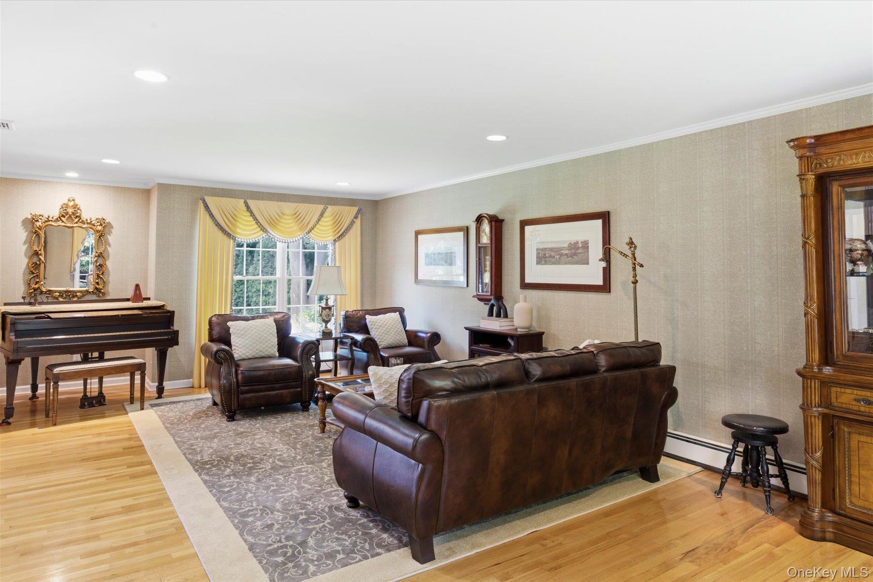 6 Brandy Road Cold Spring Harbor, NY 11724 - Photo 13 of 25 a living room with furniture and a wooden floor