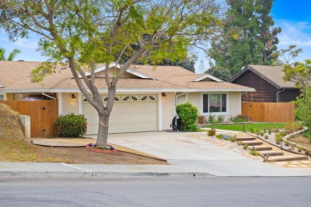 front view of a house with a patio