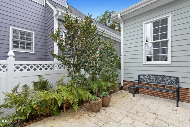 a front view of a house with garage