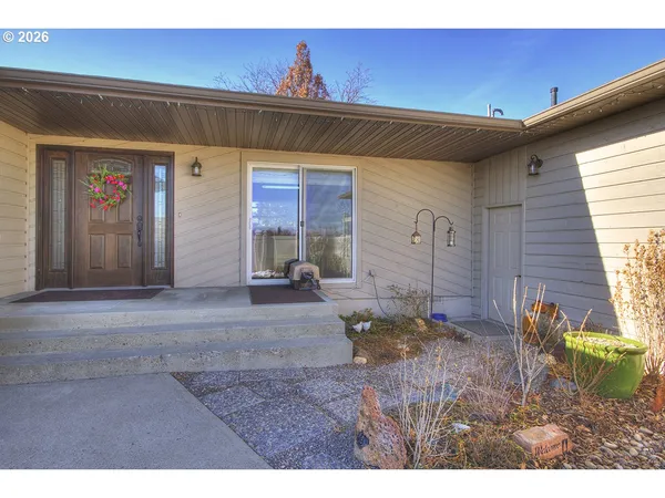 a view of room with wooden floor