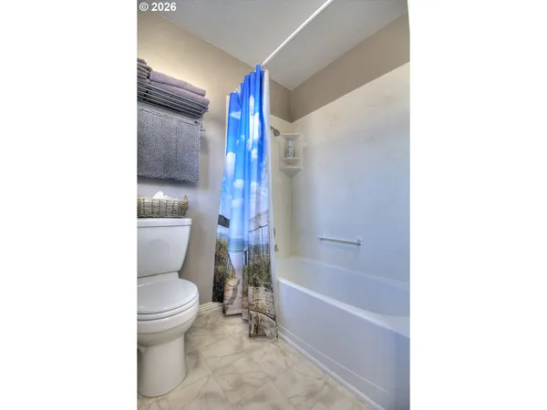 a view of a kitchen from the hallway