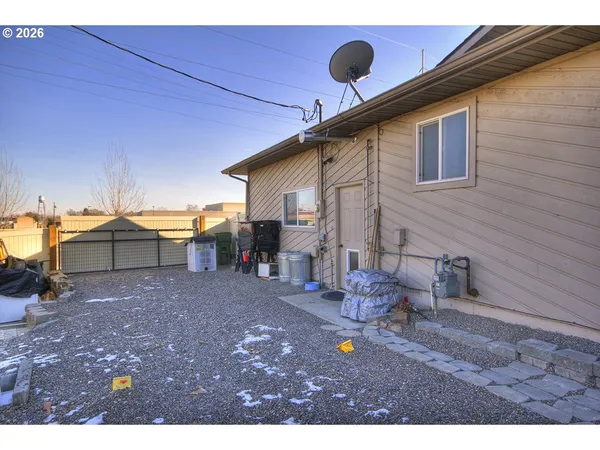 a view of a living room and kitchen