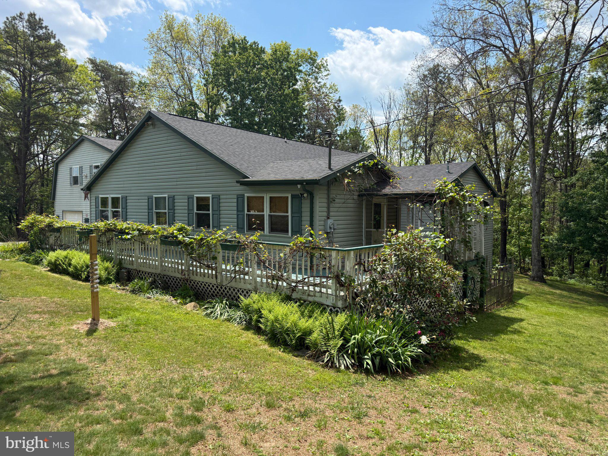 575 North River Highlands Road Delray, WV 26714 - Photo 2 of 8 Charming home embraced by nature.