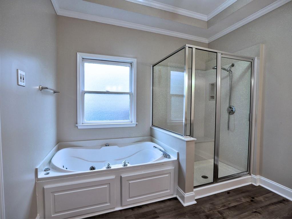 3221 Summer Stream Lane Kennesaw, GA 30152 - Photo 14 of 20 a bathroom with a tub and a window