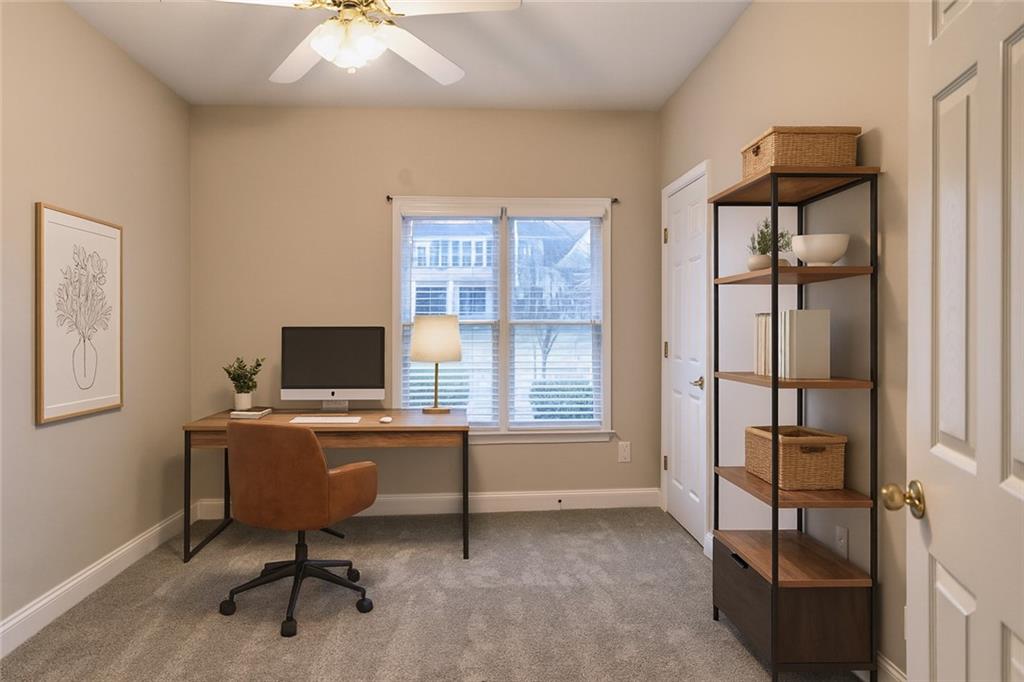 3221 Summer Stream Lane Kennesaw, GA 30152 - Photo 15 of 20 a view of a workspace with furniture and a window