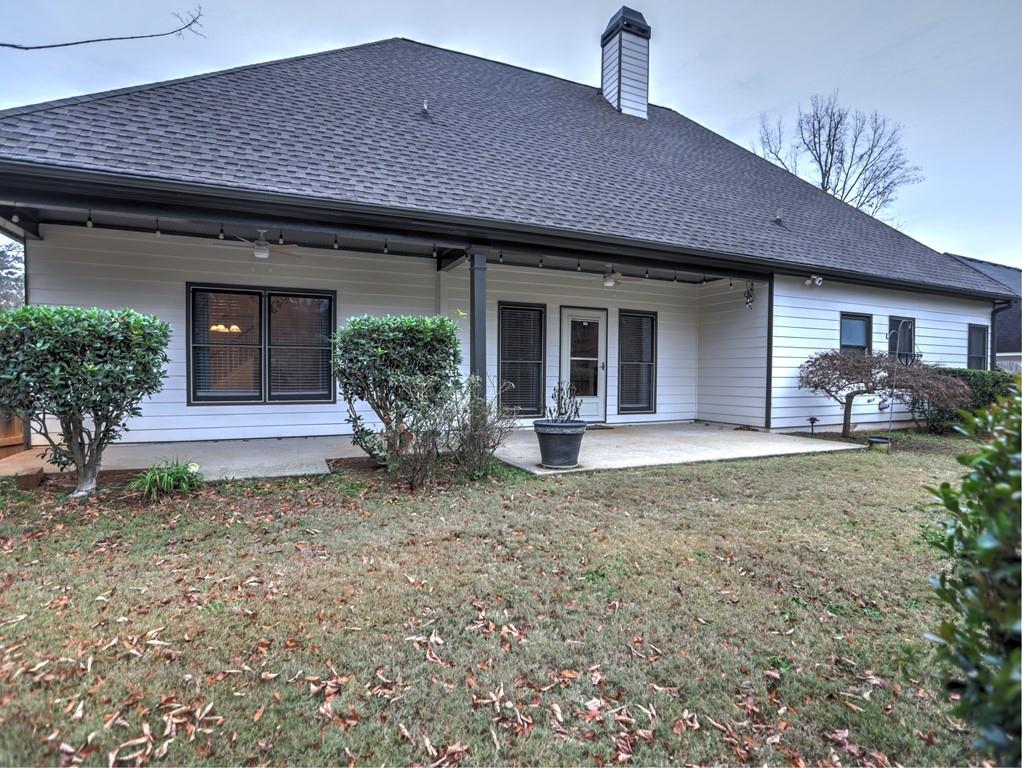 3221 Summer Stream Lane Kennesaw, GA 30152 - Photo 18 of 20 a front view of a house with garden