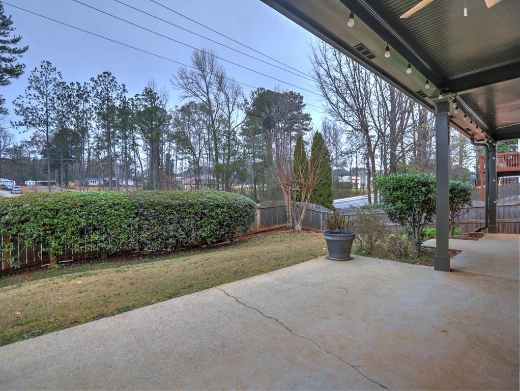 3221 Summer Stream Lane Kennesaw, GA 30152 - Photo 19 of 20 a view of a garden with large tree