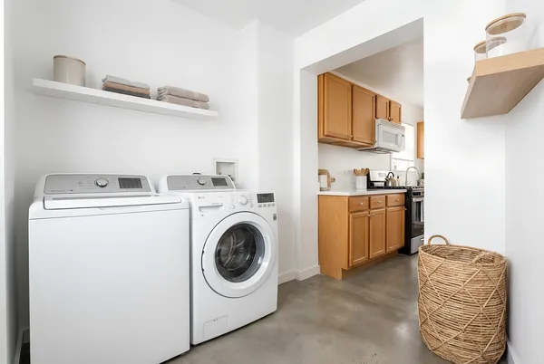 a utility room with dryer and washer