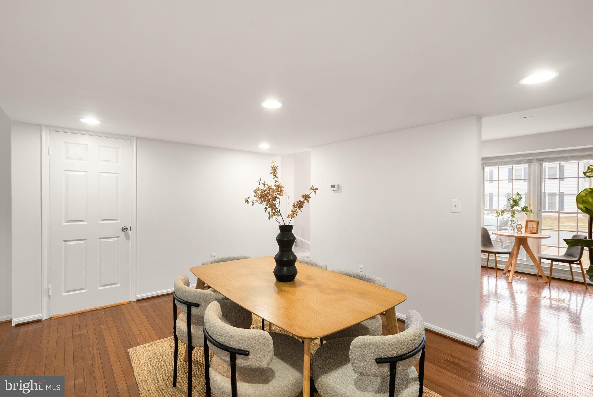 3203 Foothill Street Woodbridge, VA 22192 - Photo 13 of 57 a view of a dining room with furniture and wooden floor