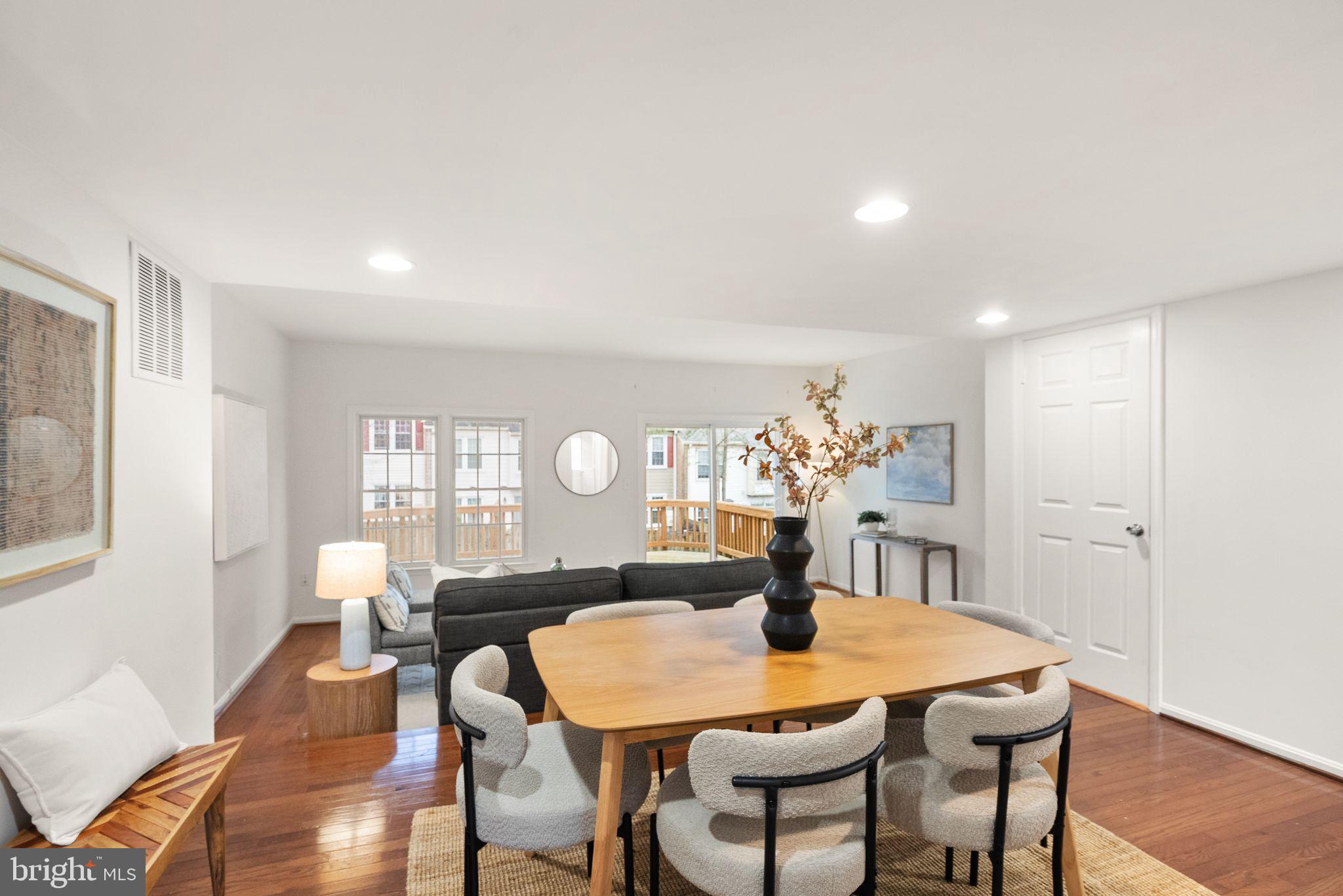 3203 Foothill Street Woodbridge, VA 22192 - Photo 14 of 57 a view of a dining room with furniture and wooden floor