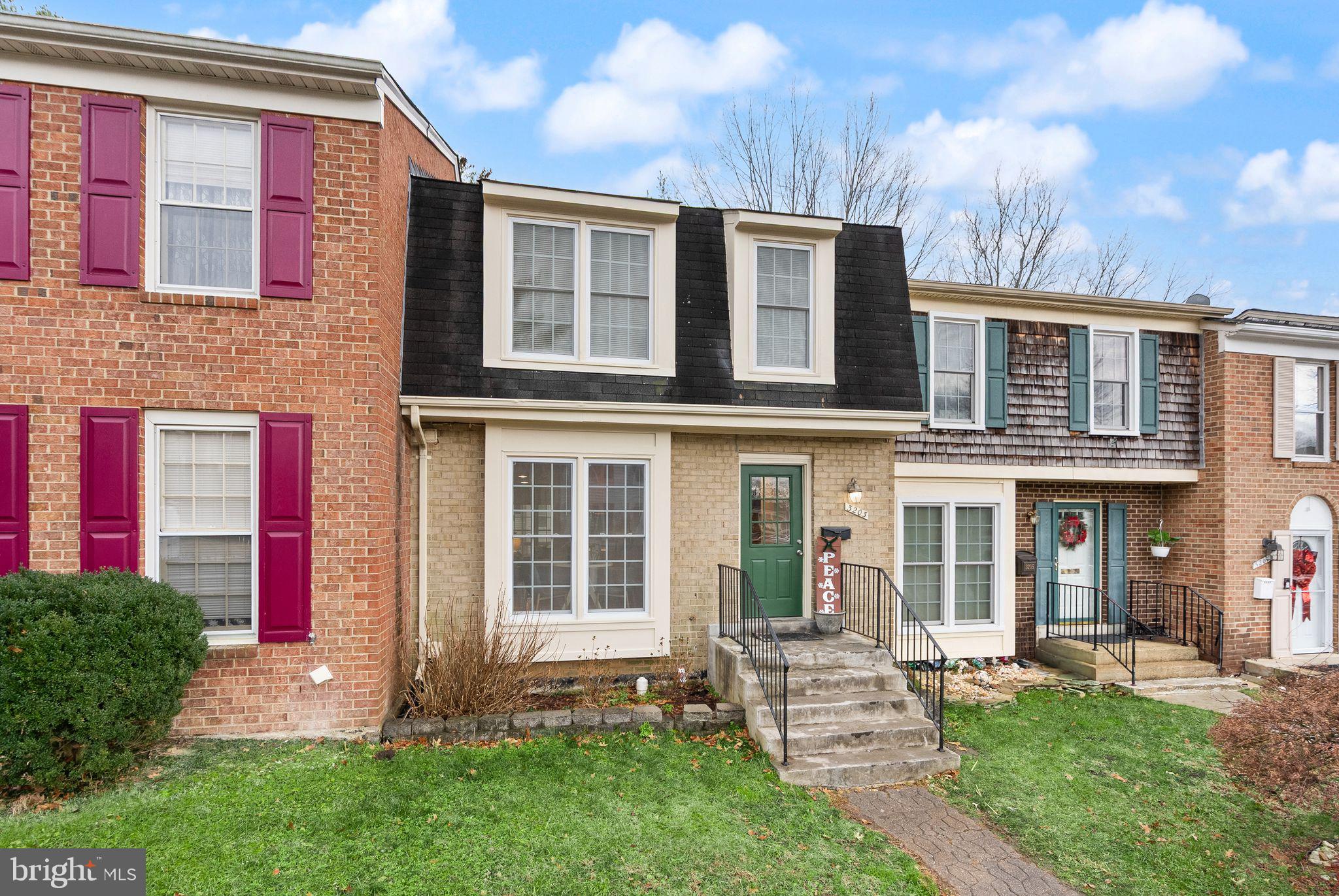 3203 Foothill Street Woodbridge, VA 22192 - Photo 2 of 57 a front view of a house with a yard