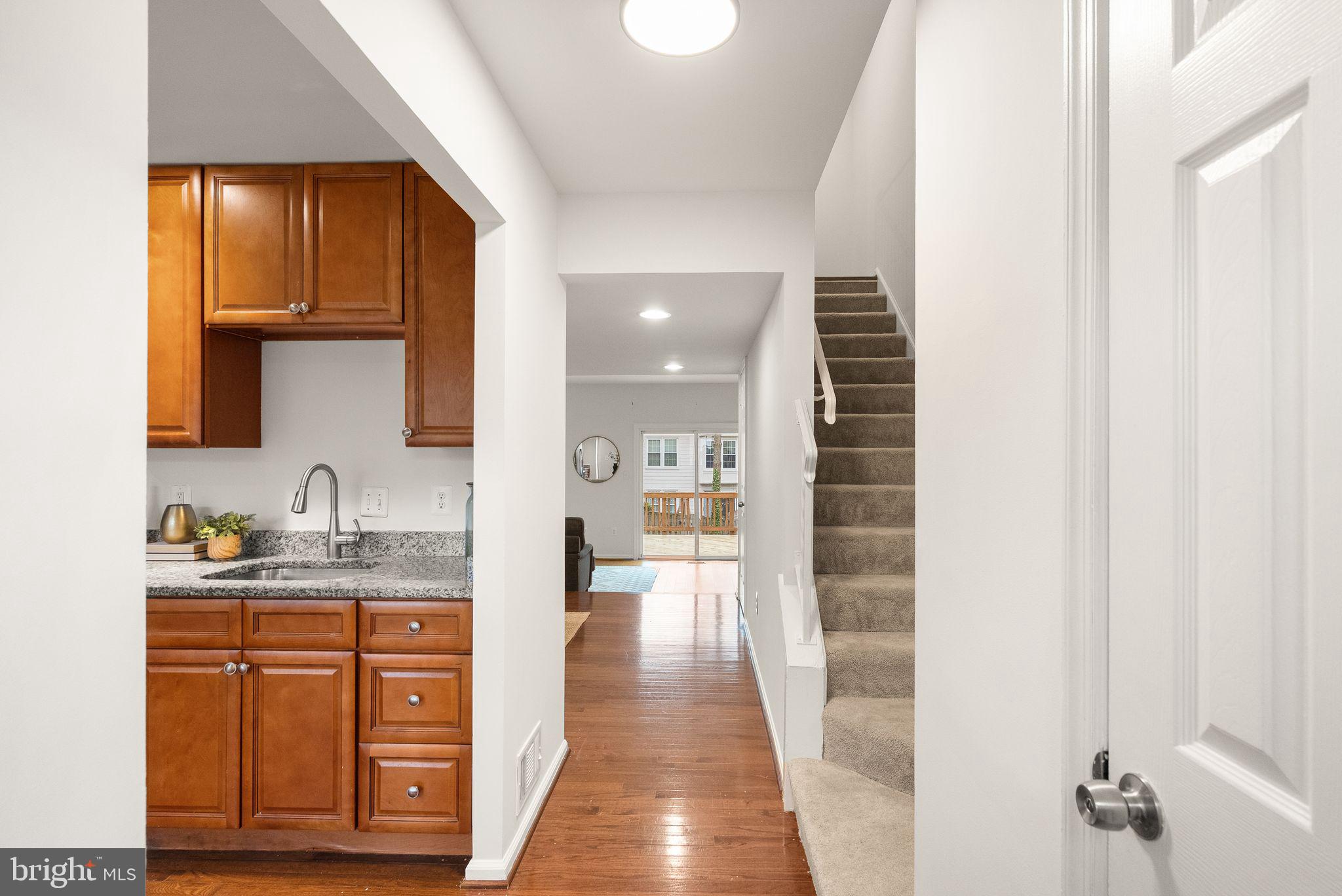 3203 Foothill Street Woodbridge, VA 22192 - Photo 4 of 57 a view of a kitchen from the hallway