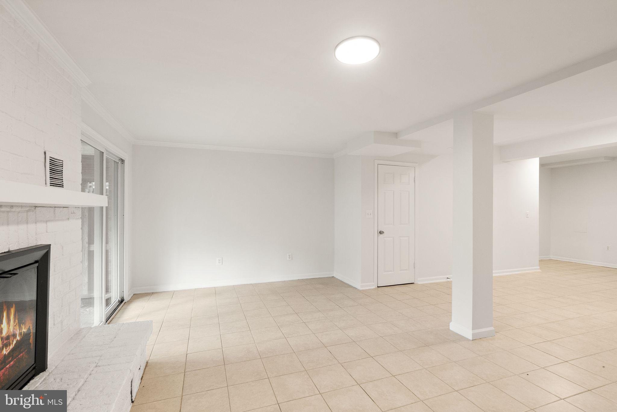 3203 Foothill Street Woodbridge, VA 22192 - Photo 47 of 57 an empty room with fireplace