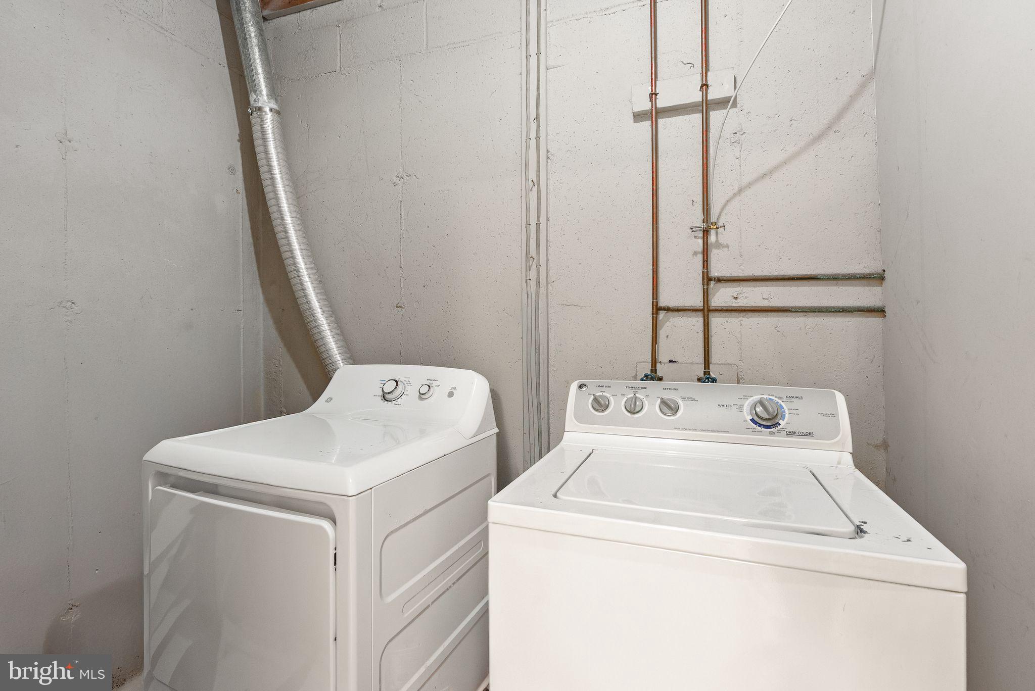 3203 Foothill Street Woodbridge, VA 22192 - Photo 49 of 57 a utility room with dryer and washer