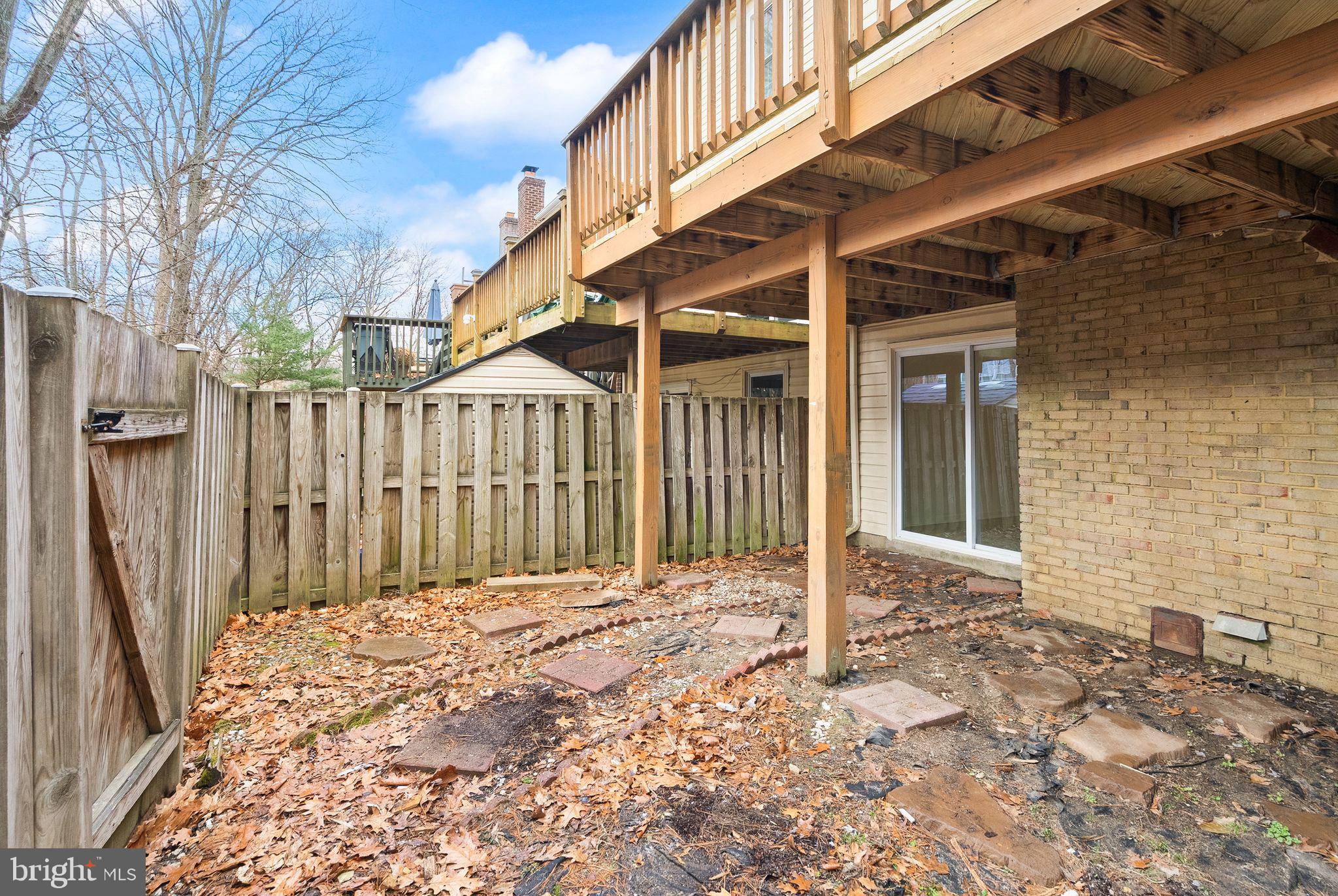 3203 Foothill Street Woodbridge, VA 22192 - Photo 52 of 57 a view of a house with a wooden fence