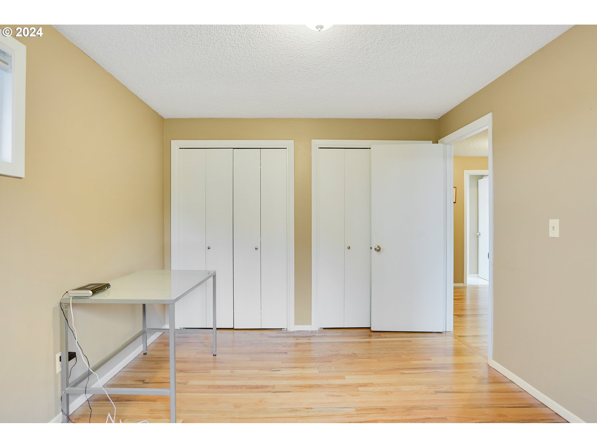 390 Northwest Conifer Boulevard Corvallis, OR 97330 - Photo 20 of 47 a view of an empty room with wooden floor