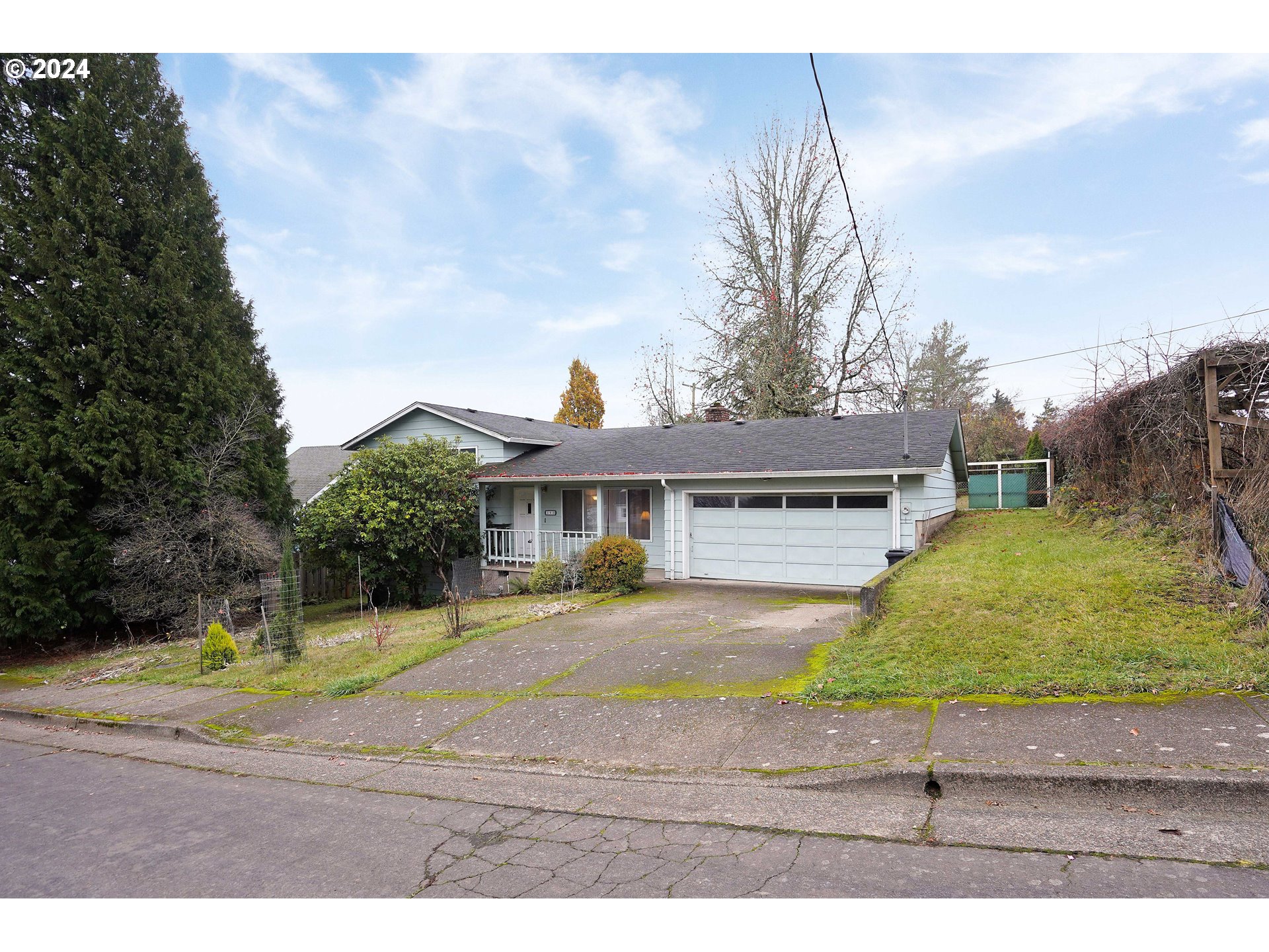 390 Northwest Conifer Boulevard Corvallis, OR 97330 - Photo 2 of 47 a view of a yard and front of a house