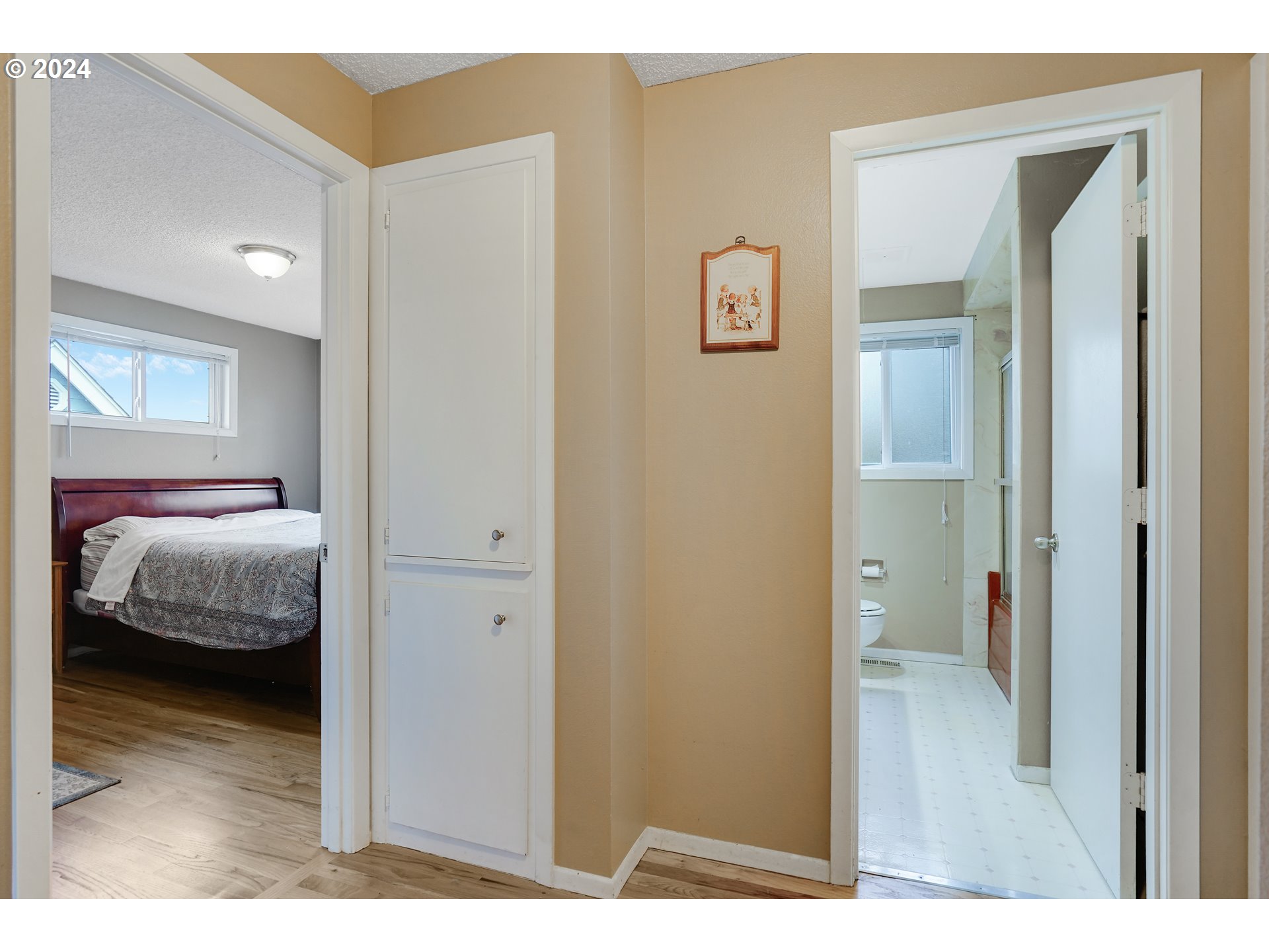 390 Northwest Conifer Boulevard Corvallis, OR 97330 - Photo 26 of 47 a en suite bathroom with a sink and a mirror