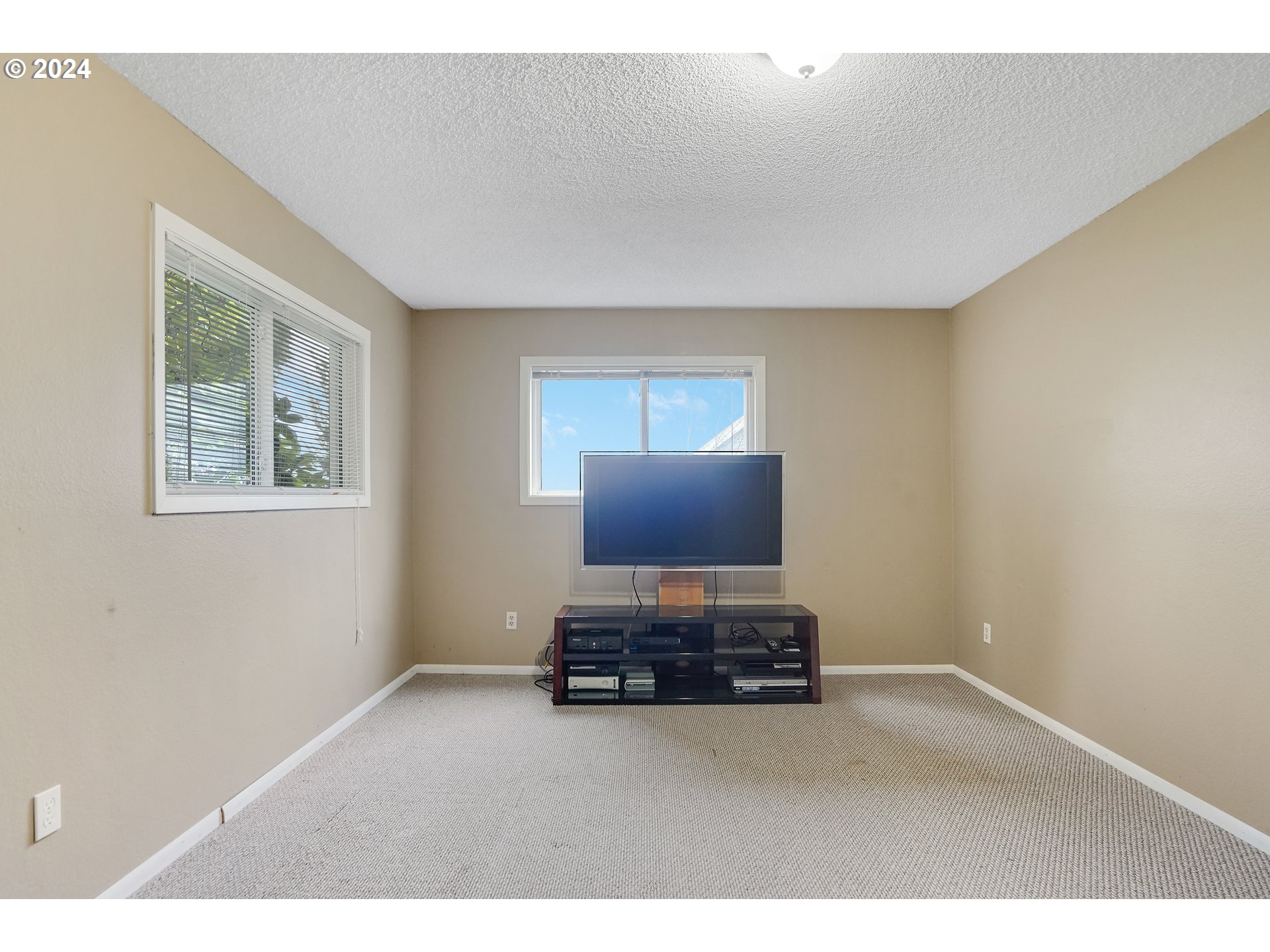 390 Northwest Conifer Boulevard Corvallis, OR 97330 - Photo 35 of 47 a bedroom with furniture and window