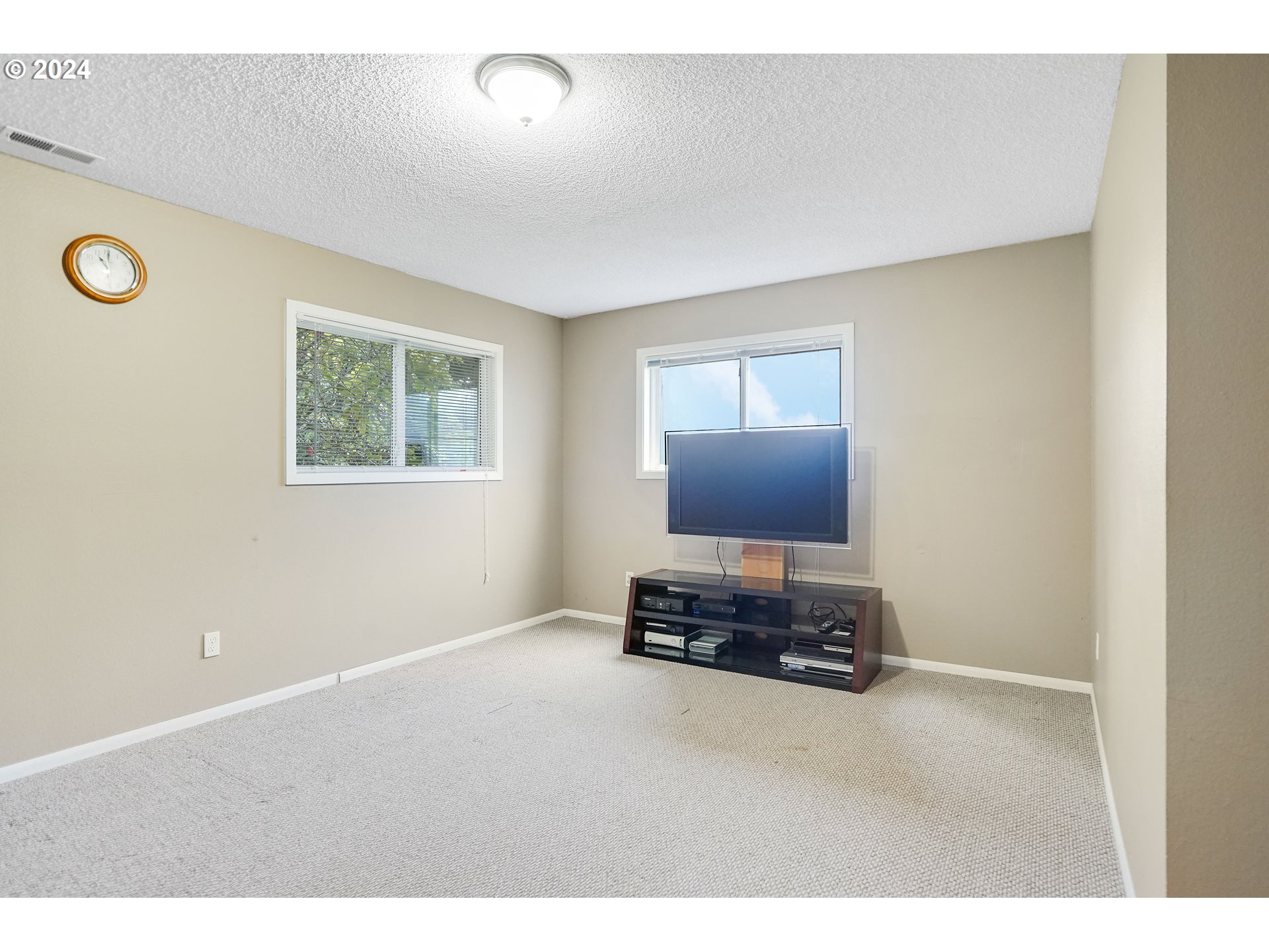 390 Northwest Conifer Boulevard Corvallis, OR 97330 - Photo 36 of 47 a living room with a bed furniture and a window