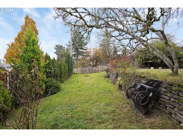 a view of a yard with an outdoor space