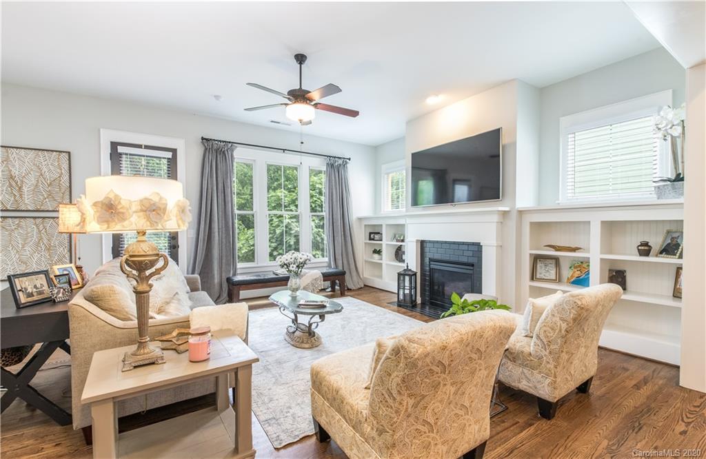 440 Hollyhock Lane Fort Mill, SC 29708 - Photo 3 of 28 a living room with furniture fireplace and a large window