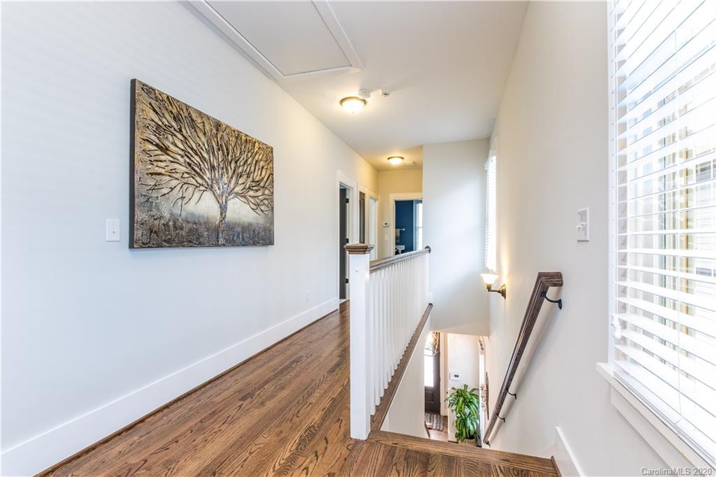 440 Hollyhock Lane Fort Mill, SC 29708 - Photo 21 of 28 a view of hallway with furniture and wooden floor