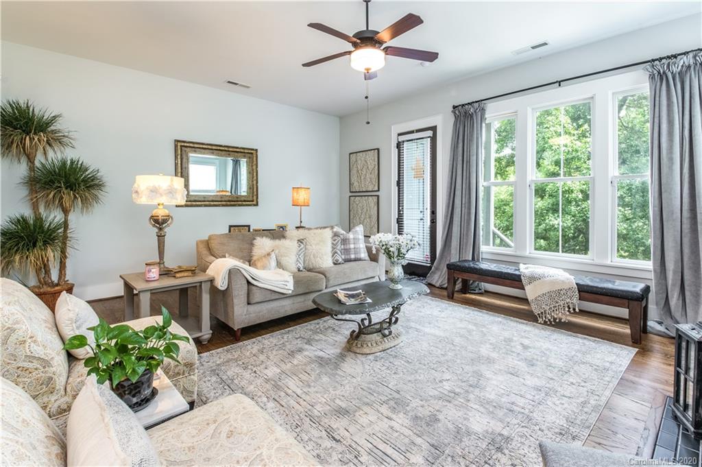 440 Hollyhock Lane Fort Mill, SC 29708 - Photo 6 of 28 a living room with furniture and a large window
