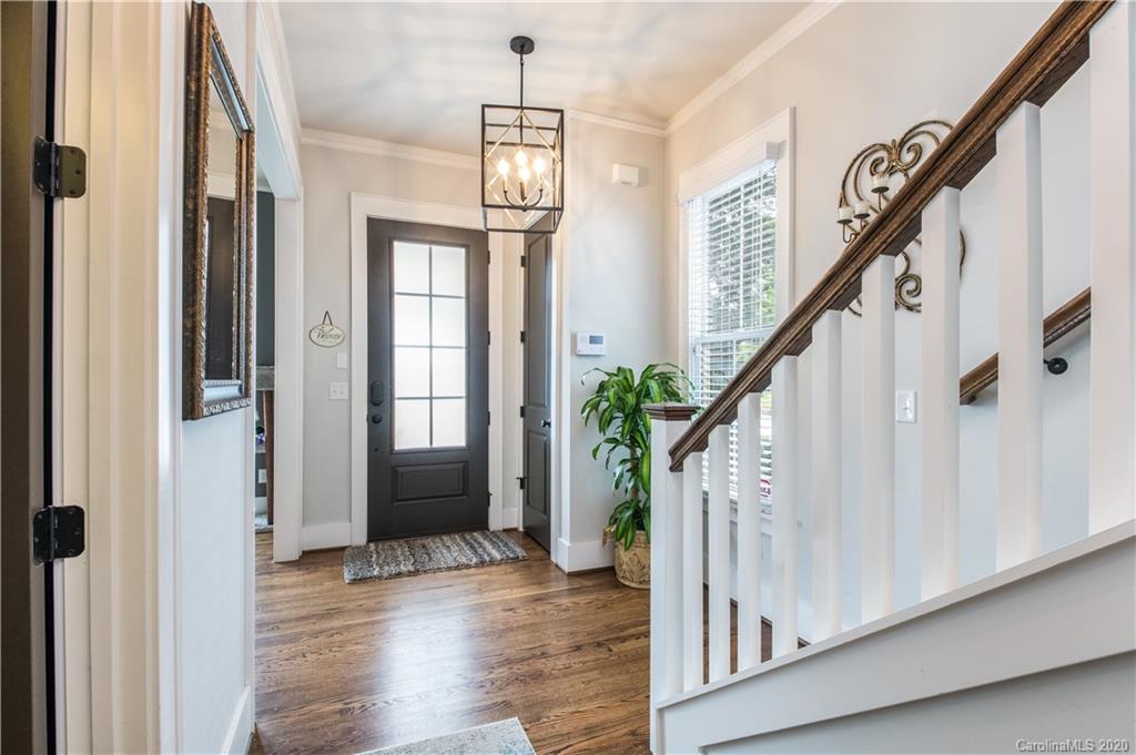 440 Hollyhock Lane Fort Mill, SC 29708 - Photo 8 of 28 a view of an entryway with wooden floor and stairs