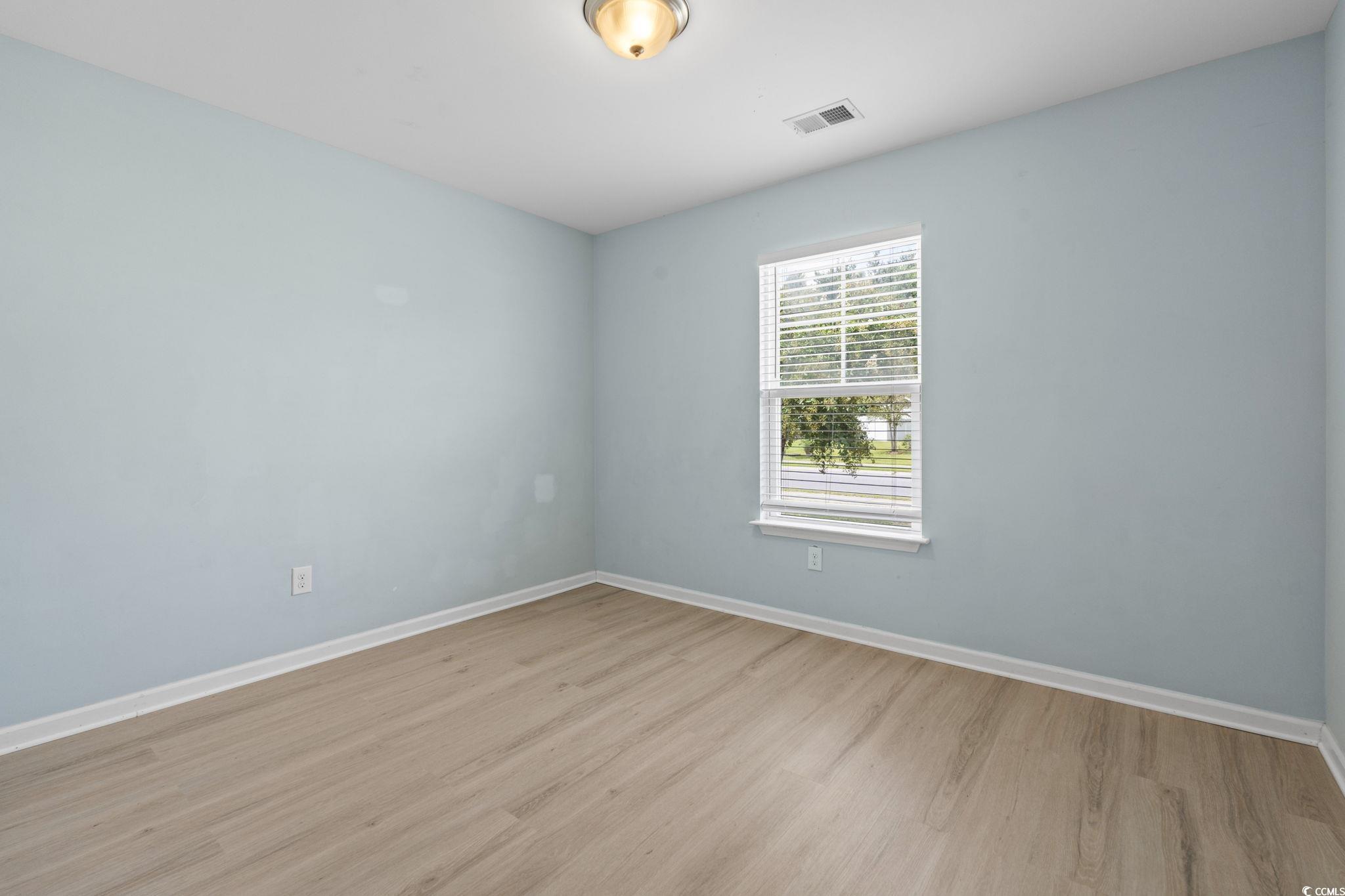 3151 Holly Loop Conway, SC 29527 - Photo 20 of 31 Empty room featuring baseboards and light wood finished floors