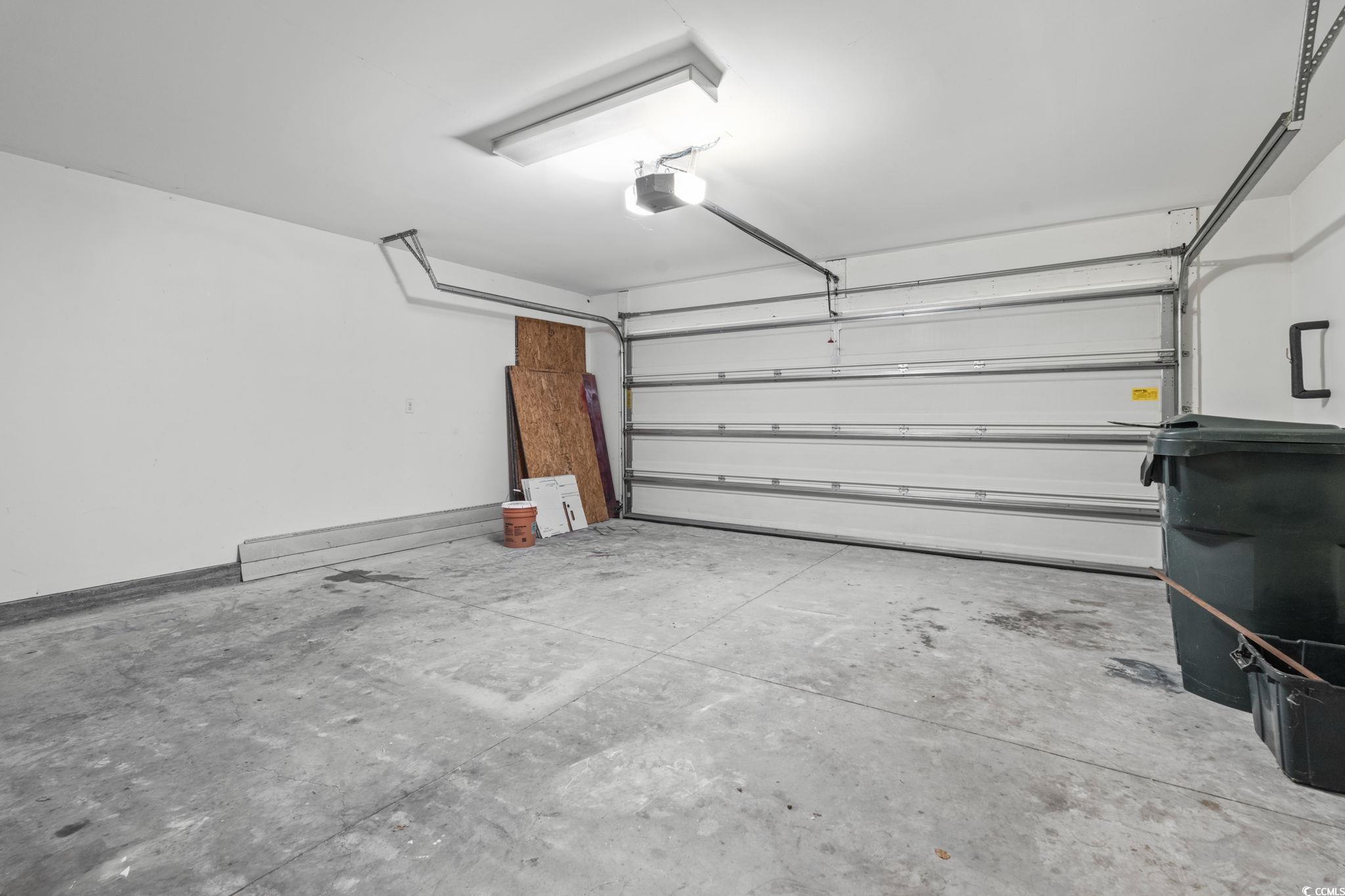 3151 Holly Loop Conway, SC 29527 - Photo 24 of 31 Garage with a garage door opener