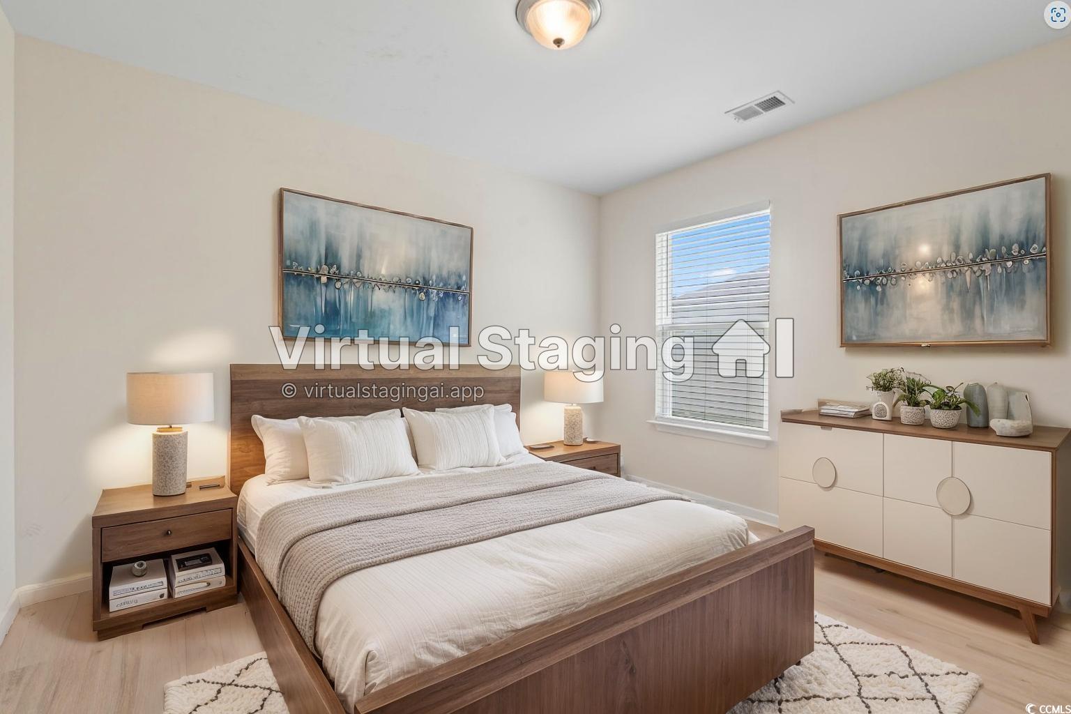 3151 Holly Loop Conway, SC 29527 - Photo 7 of 31 Bedroom with light wood-style floors and baseboards