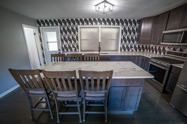 a view of a dining room with furniture