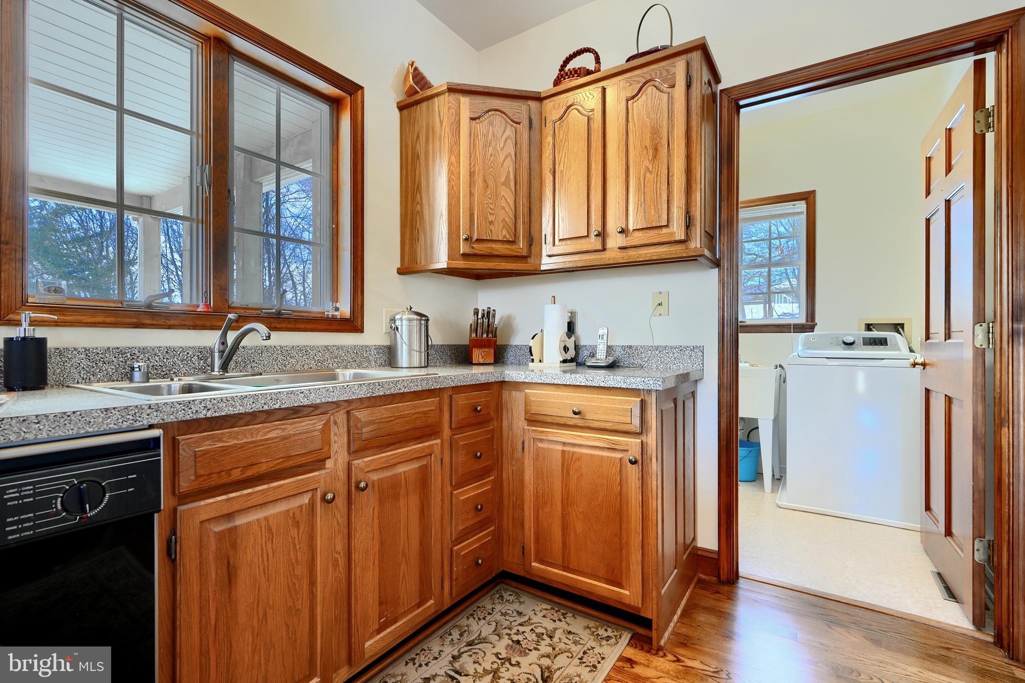 19824 Valley Mill Road Freeland, MD 21053 - Photo 38 of 72 a kitchen with stainless steel appliances granite countertop cabinets and window