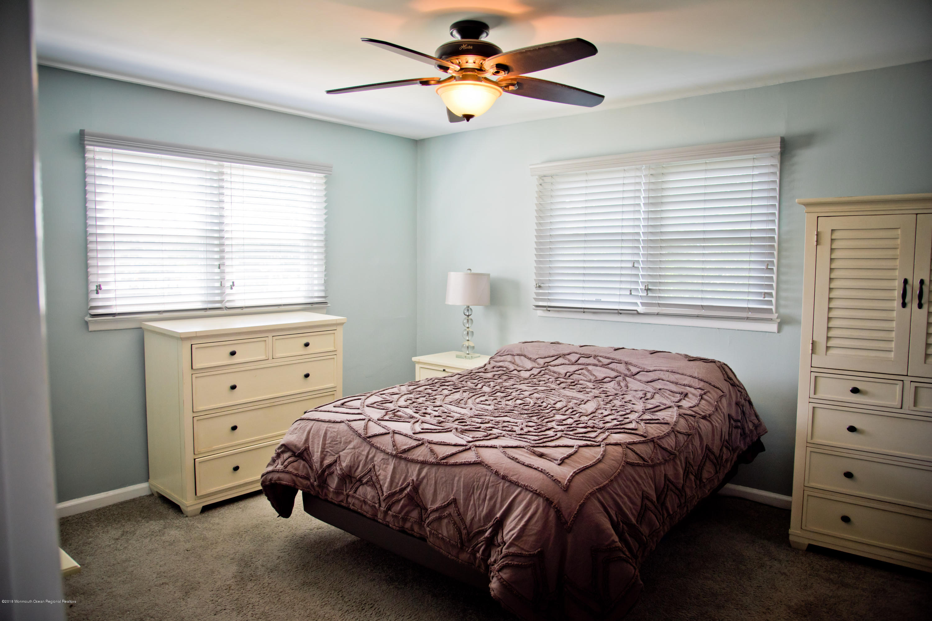 824 Beaver Dam Road Point Pleasant, NJ 08742 - Photo 18 of 35 a bedroom with a bed and a window dresser